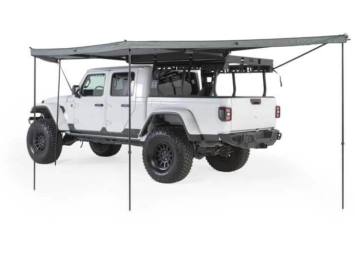 Smittybilt 180° Awning mounted on a vehicle, providing shade and outdoor protection.