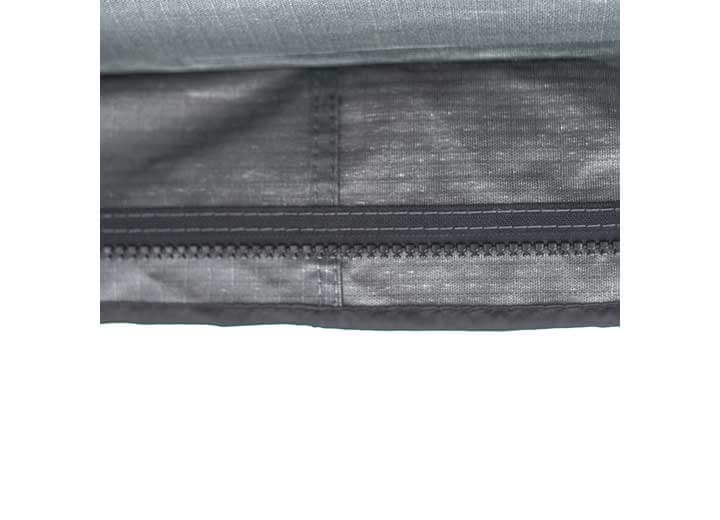 Close-up of the durable zipper detail on Smittybilt 180° Awning fabric for added weather protection.